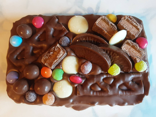 Belgian Milk Chocolate Flapjack Slab with Chocolate and Jelly Sweets.