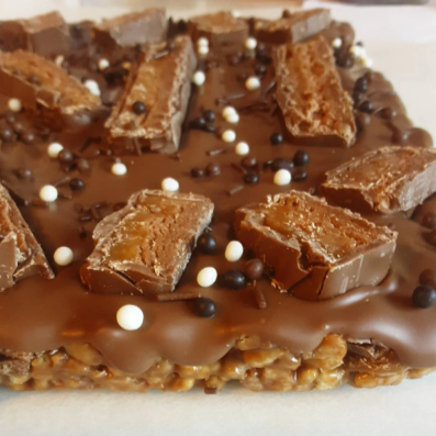 Mars Bar Rice Krispie Slab topped with Belgian Milk Chocolate.