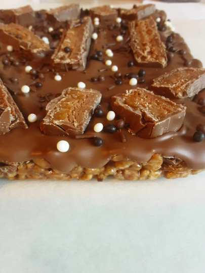 Mars Bar Rice Krispie Slab topped with Belgian Milk Chocolate.